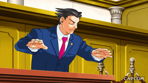 The blue ace attorney pushes his hands down his table.